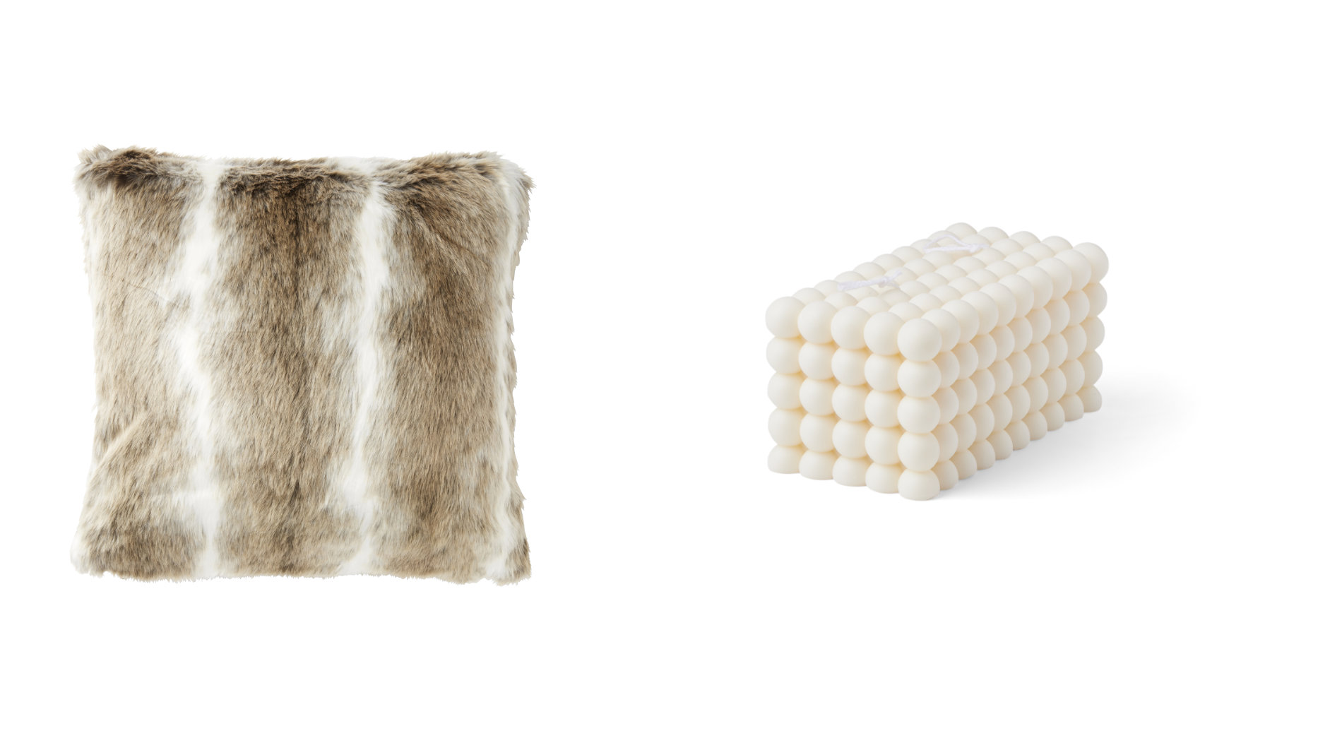 The fluffy faux-fur cushions by Skinnwille and the bubble candles by Vivi. create a cosy feel-good atmosphere. Photos: Skinnwille and by Vivi.